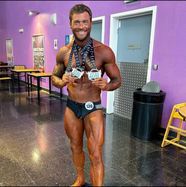 Luke winning a bodybuilding show